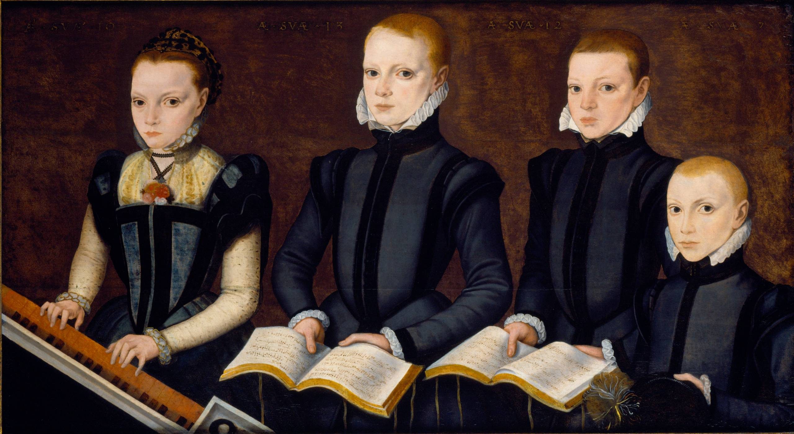 A Tudor painting of a girl and three boys. The girl is playing a piano and the boys are holding music books. They all look very serious and are in dark clothing.